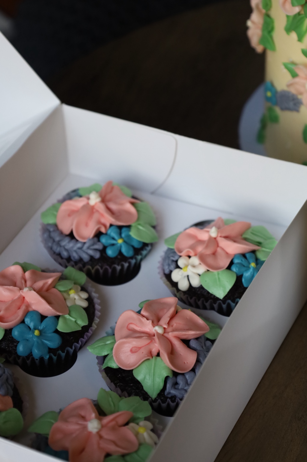Hand-piped floral cupcakes
